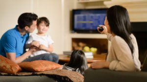 family-watching-television-full-width-people